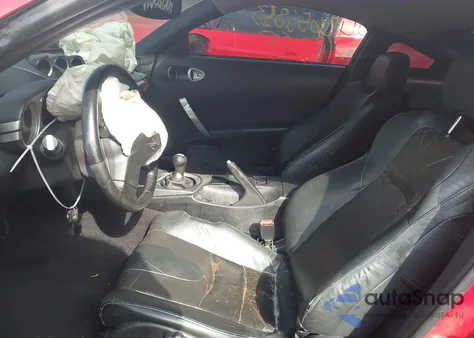 2003 Nissan 350Z Touring z USA, uszkodzony, nr VIN JN1AZ34E23T013078